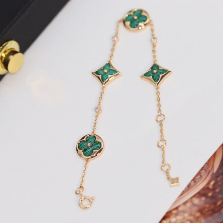 ˇGilded EraˇSTAR AND SUN 4 MOTIF PINK GOLD MALACHITE BRACELET